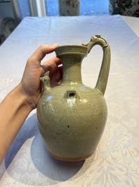 A fine Chinese Yueyao green-glazed chicken-head ewer with dragon-form handle, Southern Dynasties