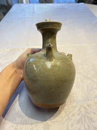 A fine Chinese Yueyao green-glazed chicken-head ewer with dragon-form handle, Southern Dynasties