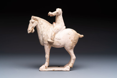 Three Chinese polychrome pottery figures, Sui/Ming