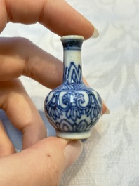 A group of 12 Chinese blue and white miniature vases and a small bottle vase, Kangxi