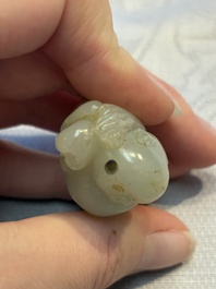 Four Chinese celadon and russet jade carvings, Qing