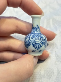 A group of 12 Chinese blue and white miniature vases and a small bottle vase, Kangxi