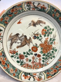 A pair of Chinese famille verte 'Birds Among Flowering Branches' plates, Kangxi