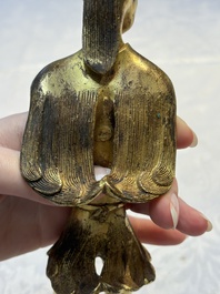 A Chinese gilt bronze figure of a birdman, probably Han