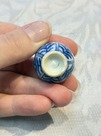 A group of 12 Chinese blue and white miniature vases and a small bottle vase, Kangxi