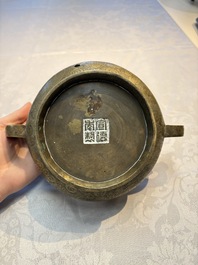 A Chinese bronze 'Dragon' censer, Xuande mark, 19th C.