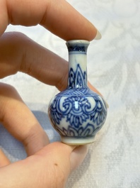 A group of 12 Chinese blue and white miniature vases and a small bottle vase, Kangxi