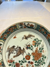 A pair of Chinese famille verte 'Birds Among Flowering Branches' plates, Kangxi