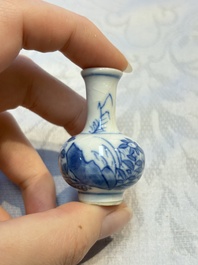 A group of 12 Chinese blue and white miniature vases and a small bottle vase, Kangxi