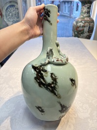 A Chinese 'Faux-Marble' celadon-ground vase with a copper-red-decorated chilong in relief, Qianlong mark and of the period