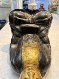 A large Chinese gilt-lacquered bronze Buddha, 17th C.