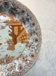 A Chinese iron-red and gilt-decorated dish with a garden scene, Kangxi