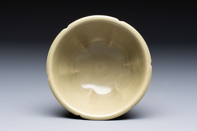 A Chinese carved Yaozhou celadon-glazed bowl with floral design, Jin