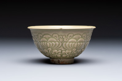 A Chinese carved Yaozhou celadon-glazed bowl with floral design, Jin