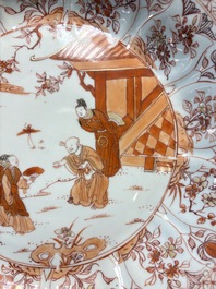 A Chinese iron-red and gilt-decorated dish with a garden scene, Kangxi