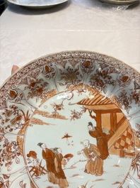 A Chinese iron-red and gilt-decorated dish with a garden scene, Kangxi