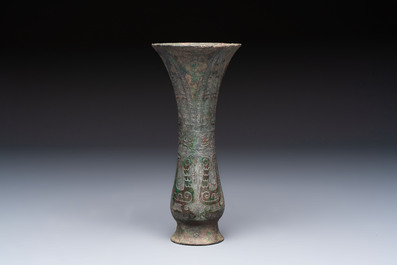 A Chinese archaic bronze wine vessel with phoenix design, Zhi 觯, Zhou