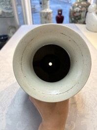 An unusual Chinese famille noire vase with relief design, Kangxi mark, 19th C.
