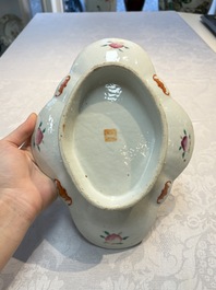 Four Chinese blue, white and famille rose tazzas and a covered spice bowl with bats design, 19th C.