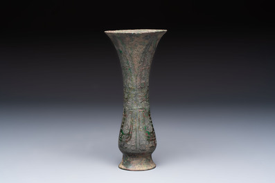 A Chinese archaic bronze wine vessel with phoenix design, Zhi 觯, Zhou