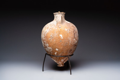 A Roman pottery olive oil transport amphora with original cover, South of Spain, 1st/3rd C.