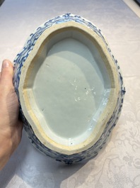 Four Chinese blue, white and famille rose tazzas and a covered spice bowl with bats design, 19th C.
