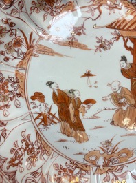 A Chinese iron-red and gilt-decorated dish with a garden scene, Kangxi