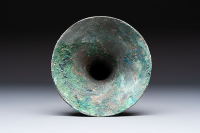 A Chinese archaic bronze wine vessel with Taotie design, Gu 觚, Shang