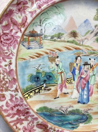 A fine Chinese Canton famille rose dish with puce-enamelled rim, 19th C.