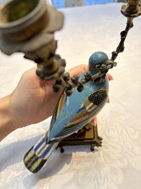 A pair of Chinese cloisonn&eacute; pigeons mounted as candelabras, 19th C.