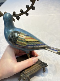 A pair of Chinese cloisonn&eacute; pigeons mounted as candelabras, 19th C.