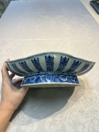 Four Chinese blue, white and famille rose tazzas and a covered spice bowl with bats design, 19th C.