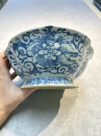 Four Chinese blue, white and famille rose tazzas and a covered spice bowl with bats design, 19th C.