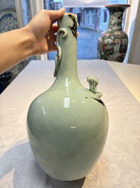 A Chinese 'Faux-Marble' celadon-ground vase with a copper-red-decorated chilong in relief, Qianlong mark and of the period