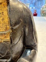 A large Chinese gilt-lacquered bronze Buddha, 17th C.