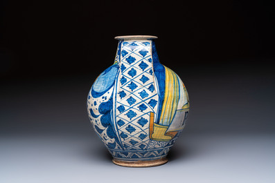 An unusual large polychrome Italian maiolica two-handled 'Cupid and Psyche' wet drug jar inscribed 'Rodomel', probably Rome, early 16th C.