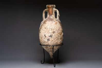 A Roman salt fish amphora and cover, Spain, 2nd/3rd C.