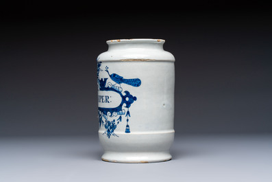 A blue and white Dutch Delft tobacco jar and a drug jar with brass lids, 18th C.