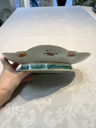 Four Chinese blue, white and famille rose tazzas and a covered spice bowl with bats design, 19th C.
