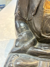 A large Chinese gilt-lacquered bronze Buddha, 17th C.
