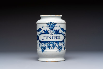 A blue and white Dutch Delft tobacco jar and a drug jar with brass lids, 18th C.