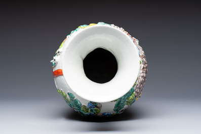 A Chinese famille verte '100 Boys' vase with relief design, 20th C.