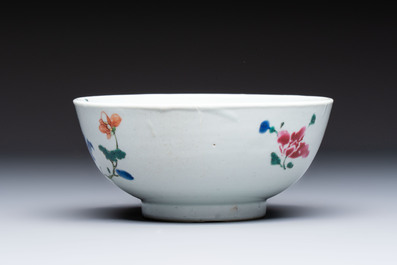 A Chinese famille rose covered ewer, a covered chocolate pot, a bowl and a dish, Qianlong