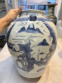 A Chinese blue and white 'Mountainous Landscape' vase with four lion-form handles, 16/17th C.