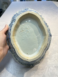 Four Chinese blue, white and famille rose tazzas and a covered spice bowl with bats design, 19th C.