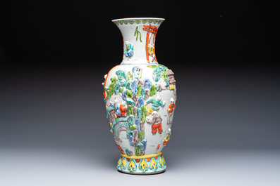 A Chinese famille verte '100 Boys' vase with relief design, 20th C.