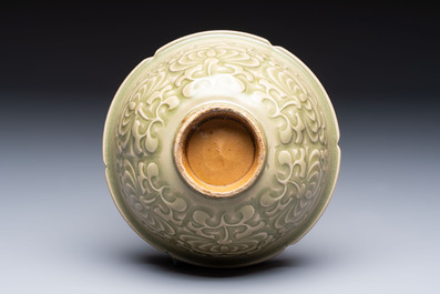 A Chinese carved Yaozhou celadon-glazed bowl with floral design, Jin