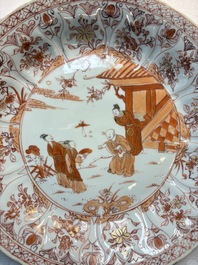 A Chinese iron-red and gilt-decorated dish with a garden scene, Kangxi