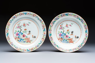Four Chinese famille rose 'Roosters' plates and a 'Crane' dish, Qianlong
