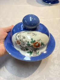 Two Chinese famille verte blue-ground vases and covers, 19th C.